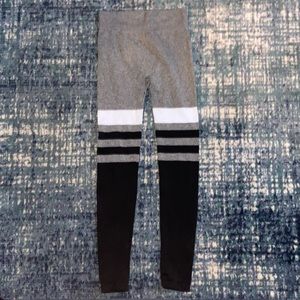 Just One black, white, and grey stretch pants size M.